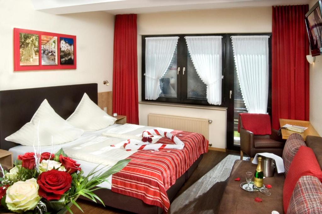 Postel nebo postele na pokoji v ubytování Hotel Hauer