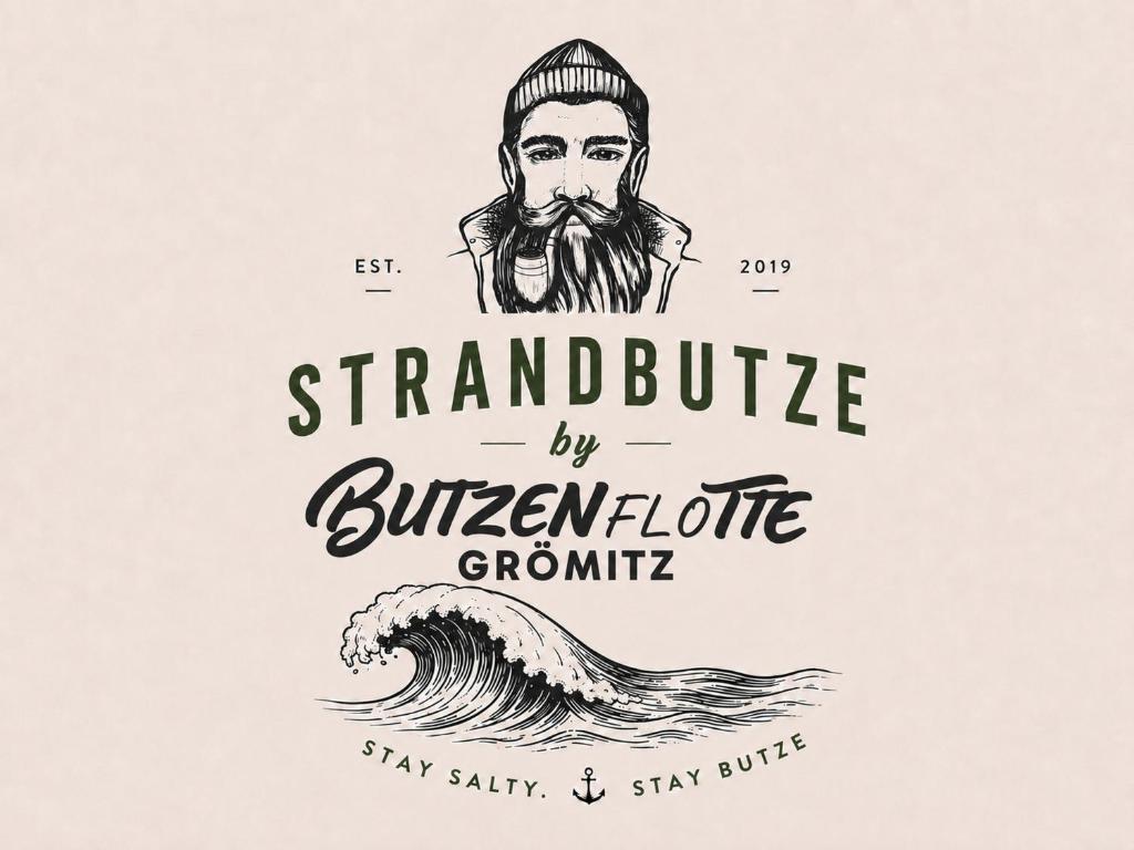 a sketch of a man with a beard and a wave at STRANDBUTZE by BUTZENFLOTTE Grömitz - Beach Vibes & 100 Meter zum Meer in Grömitz