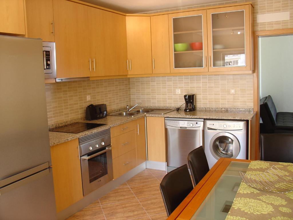 Virtuvė arba virtuvėlė apgyvendinimo įstaigoje Apartamento Sol e Mar 2