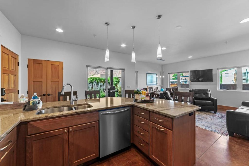 a kitchen with a sink and a counter top at 57 Robber's Roost in Moab
