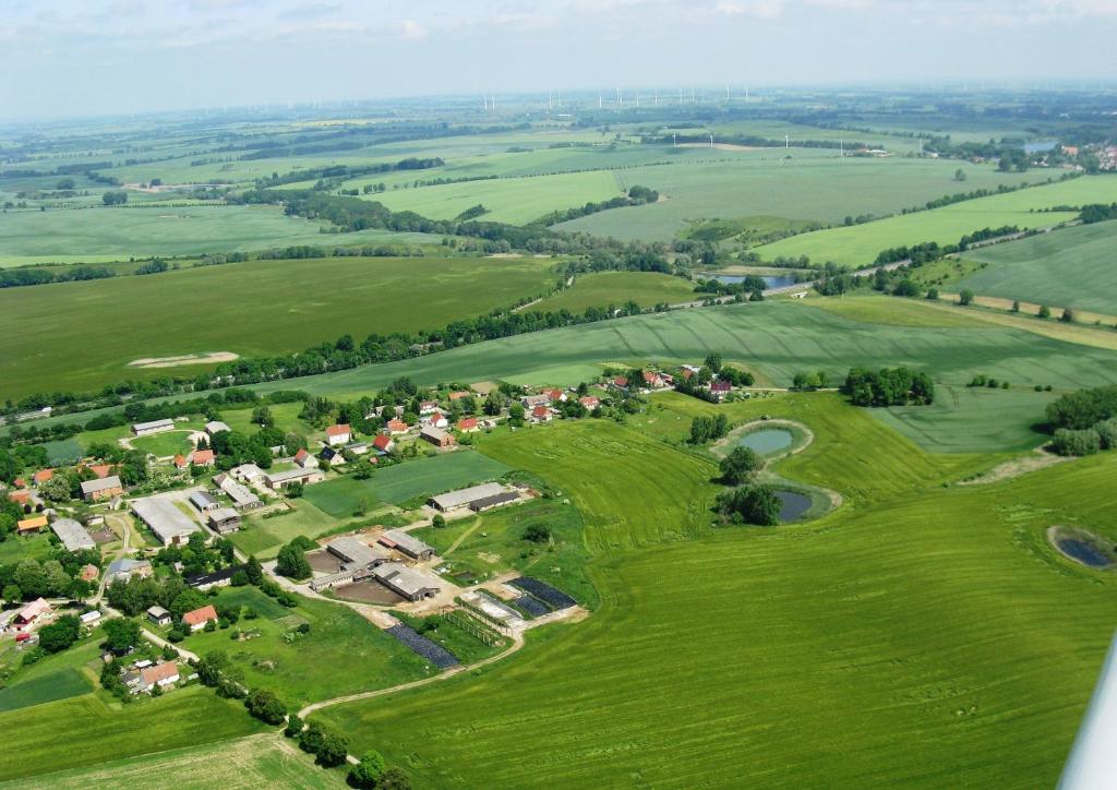 an aerial view of a village in a green field at Schwalbennest 