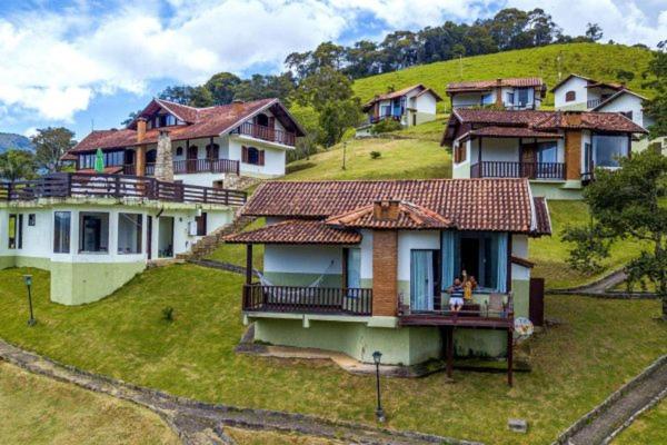 a group of houses on top of a hill at Pousada Bela Mauá in Itatiaia