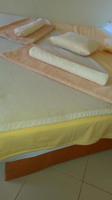 Postel nebo postele na pokoji v ubytování Apartments Feniks