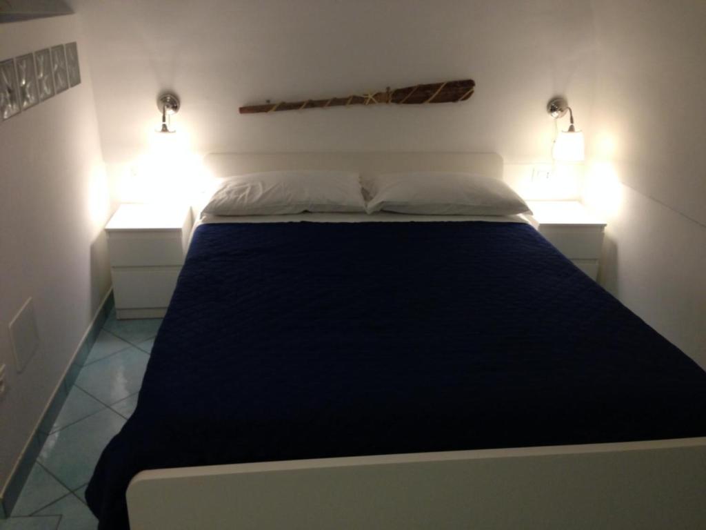 Posteľ alebo postele v izbe v ubytovaní B&B La Grotta Marina