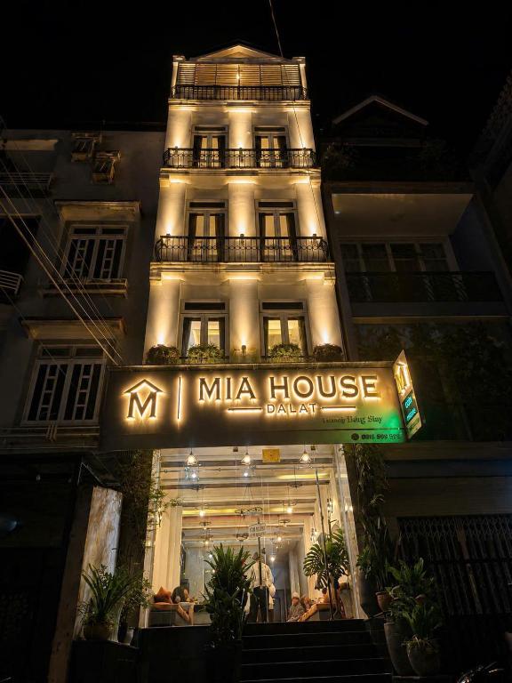 a large building with a mica house sign in front at Mia House DaLat Hotel - Bống Stay in Da Lat