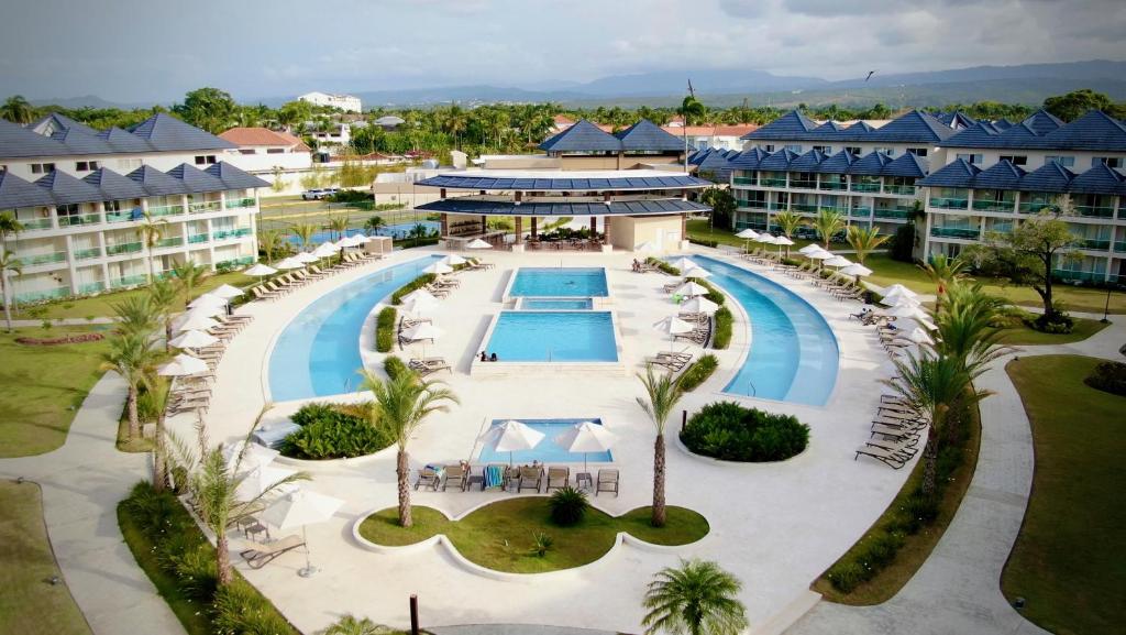 an aerial view of a resort with a pool at Xanadu Casa De La Playa in Puerto Plata