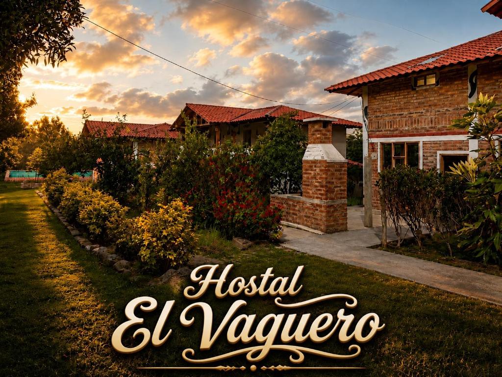 a house with the words hostel la yaya at Hostal el Vaquero in Chugchilán