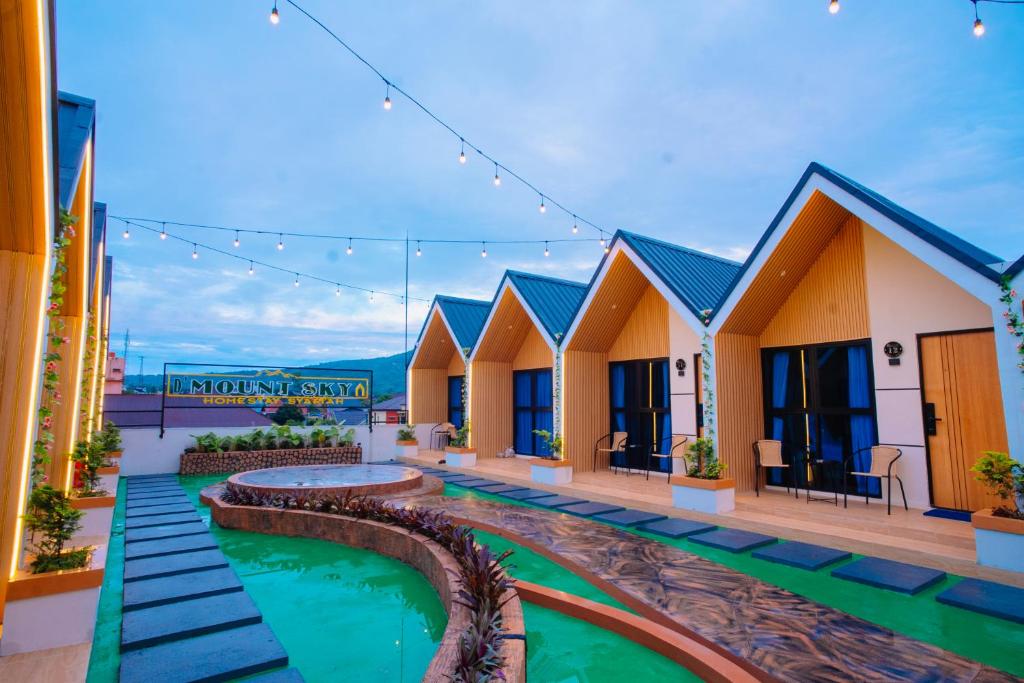 a row of cottages at a resort at D'Mount Sky Homestay Syariah in Bukittinggi