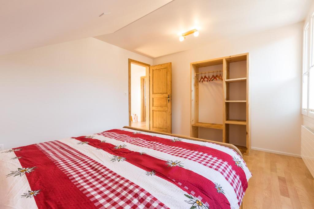 Postel nebo postele na pokoji v ubytování Pilatus Apartments