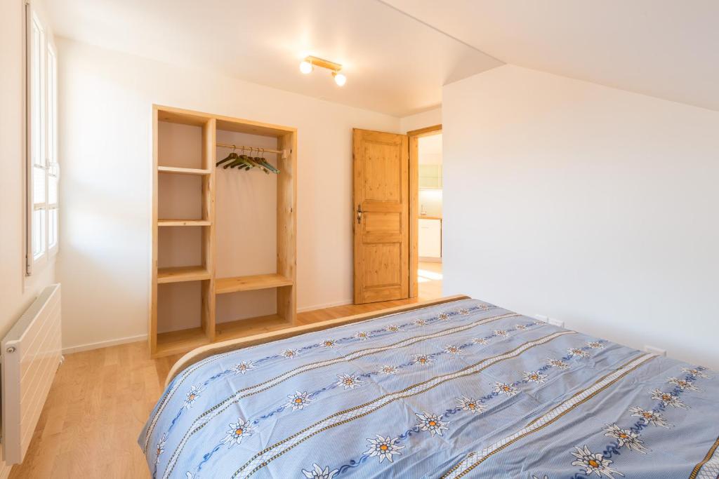 Postel nebo postele na pokoji v ubytování Pilatus Apartments
