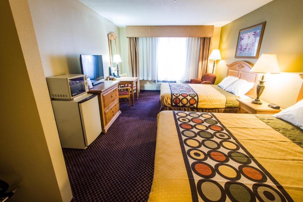 Postel nebo postele na pokoji v ubytování Super 8 by Wyndham Marana/Tucson Area