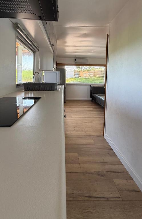 a kitchen with a counter top in a room at Bordagorria 