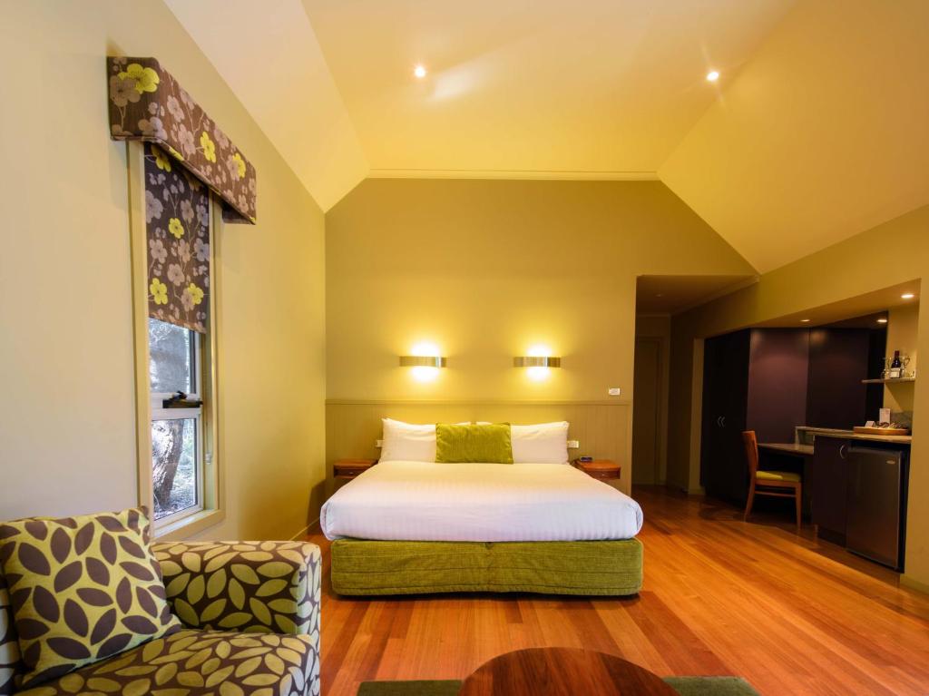 Postel nebo postele na pokoji v ubytování Freycinet Lodge