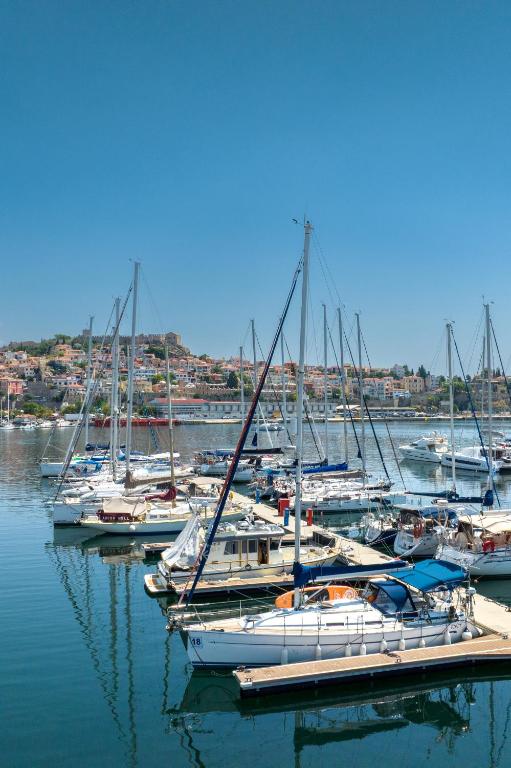 a group of boats docked in a harbor at Yacht Pipit - Unique Stay in Marina of Kavala in Kavála