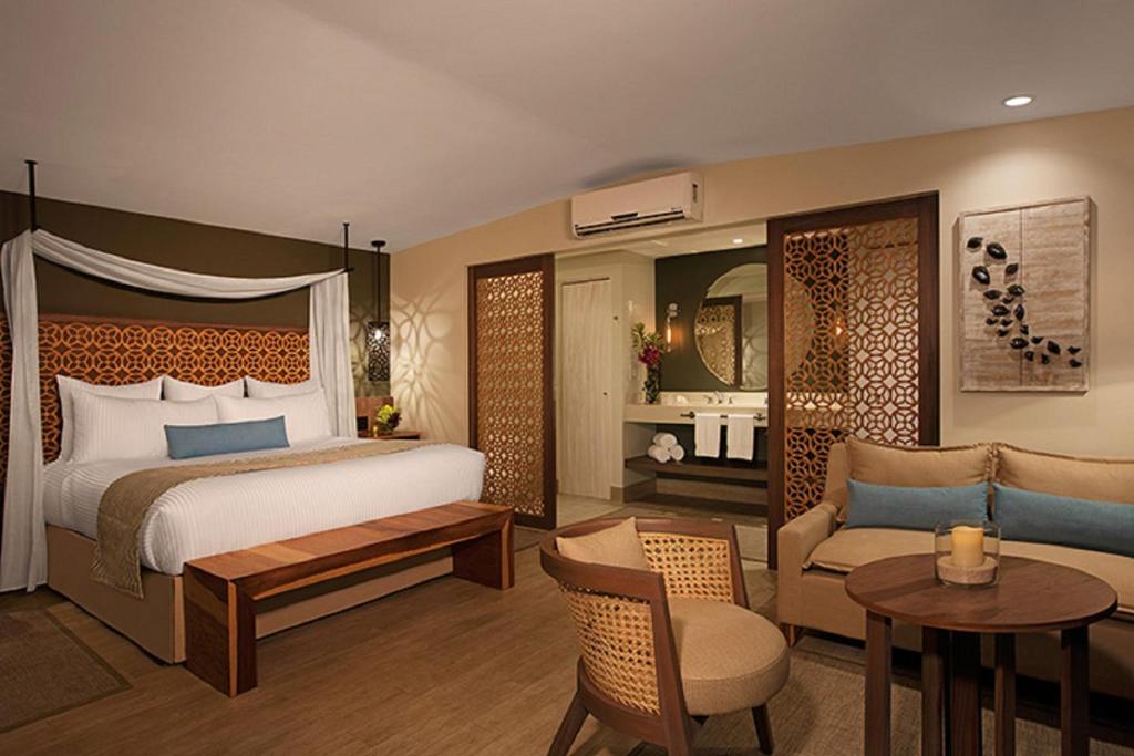 Voodi või voodid majutusasutuse Secrets Papagayo All Inclusive - Adults Only toas