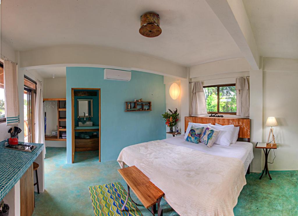 Postel nebo postele na pokoji v ubytování Sueño Grande B&B