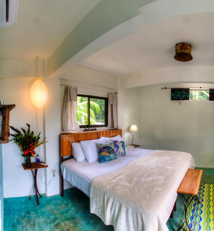 Postel nebo postele na pokoji v ubytování Sueño Grande B&B