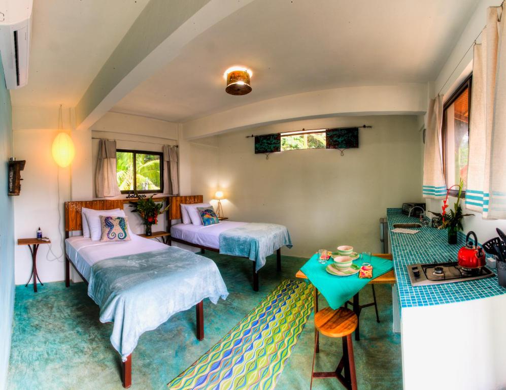 Postel nebo postele na pokoji v ubytování Sueño Grande B&B