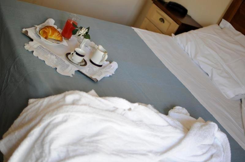Postel nebo postele na pokoji v ubytování Hotel Fly