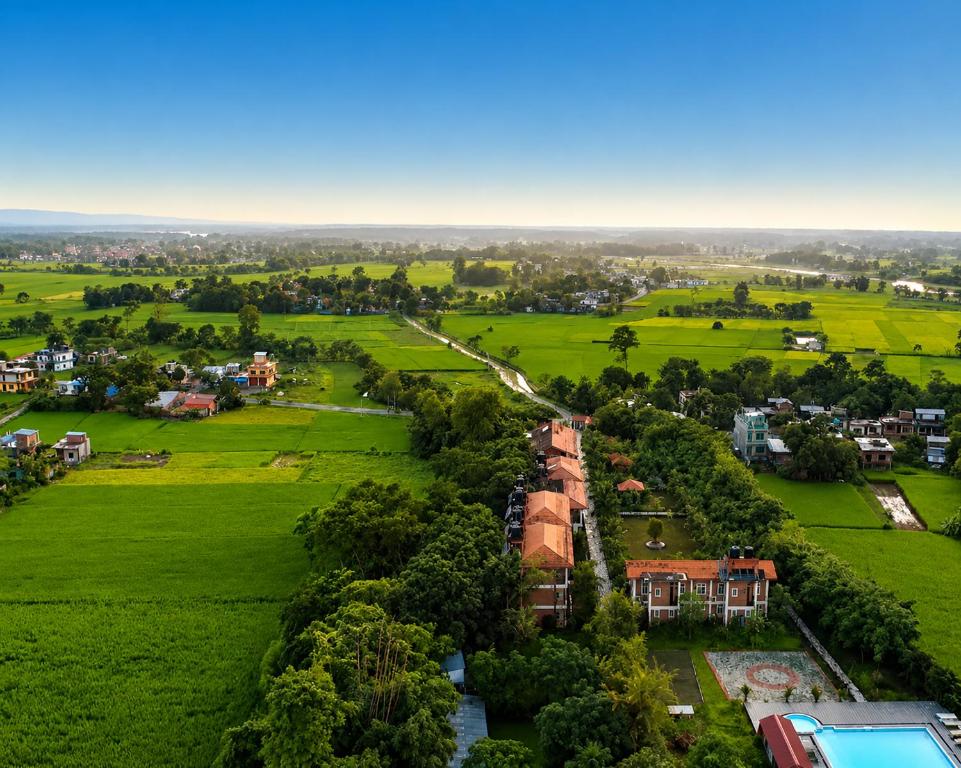 an aerial view of a park with houses and trees at Center Park Resort Pvt.Ltd in Sauraha