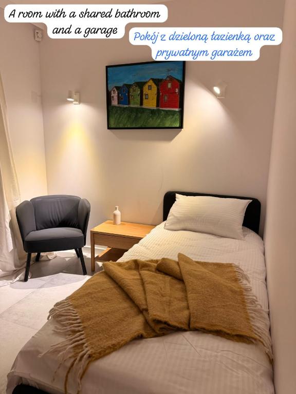 a room with a shared bedroom and agamuitous at Homestay in Dąbrowa Górnicza