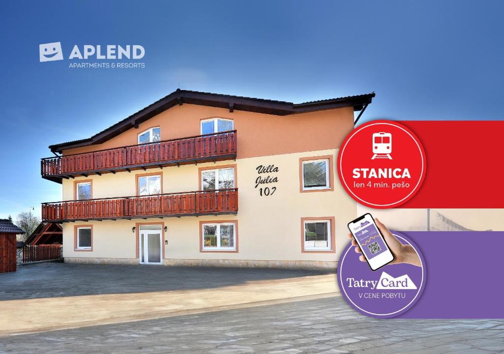 a house with a cell phone in front of it at APLEND Vila Júlia - Tatry Card v cene in Tatranská Lomnica