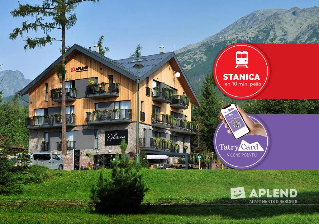 a building with a cell phone in front of it at APLEND Vila Olívia in Starý Smokovec