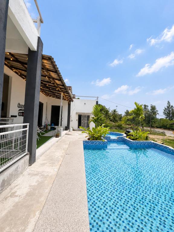 an image of a swimming pool in a villa at CasaView Island Marang in Marang
