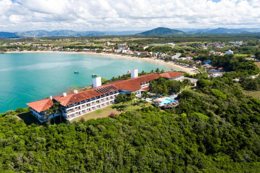 an aerial view of the resort and the beach at Hotel Pontal de Ubu in Anchieta