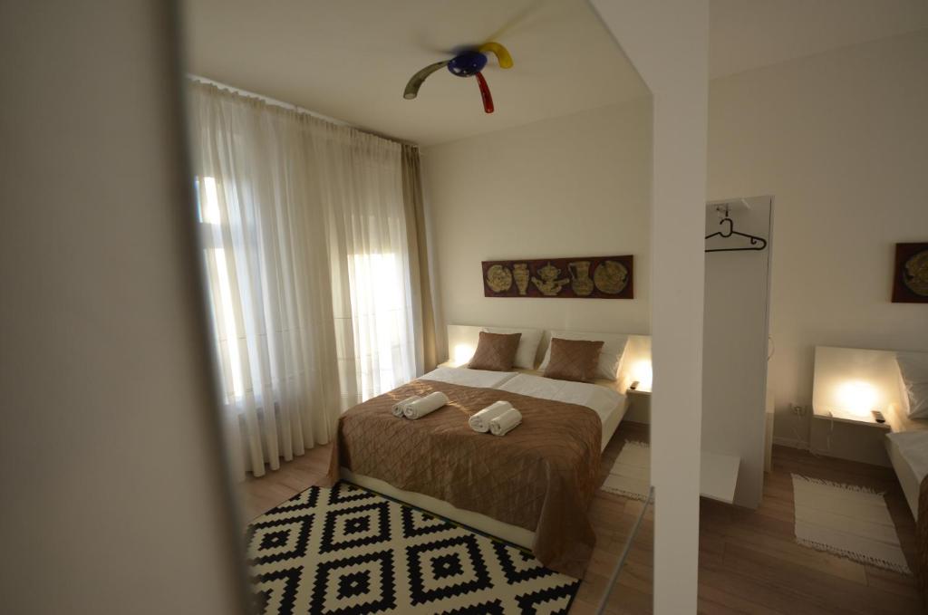 Posteľ alebo postele v izbe v ubytovaní Downtown Luxury Apartment