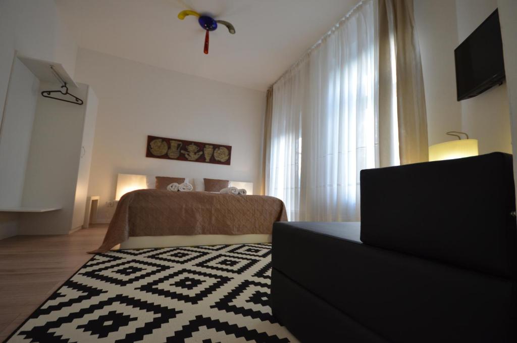 Posteľ alebo postele v izbe v ubytovaní Downtown Luxury Apartment