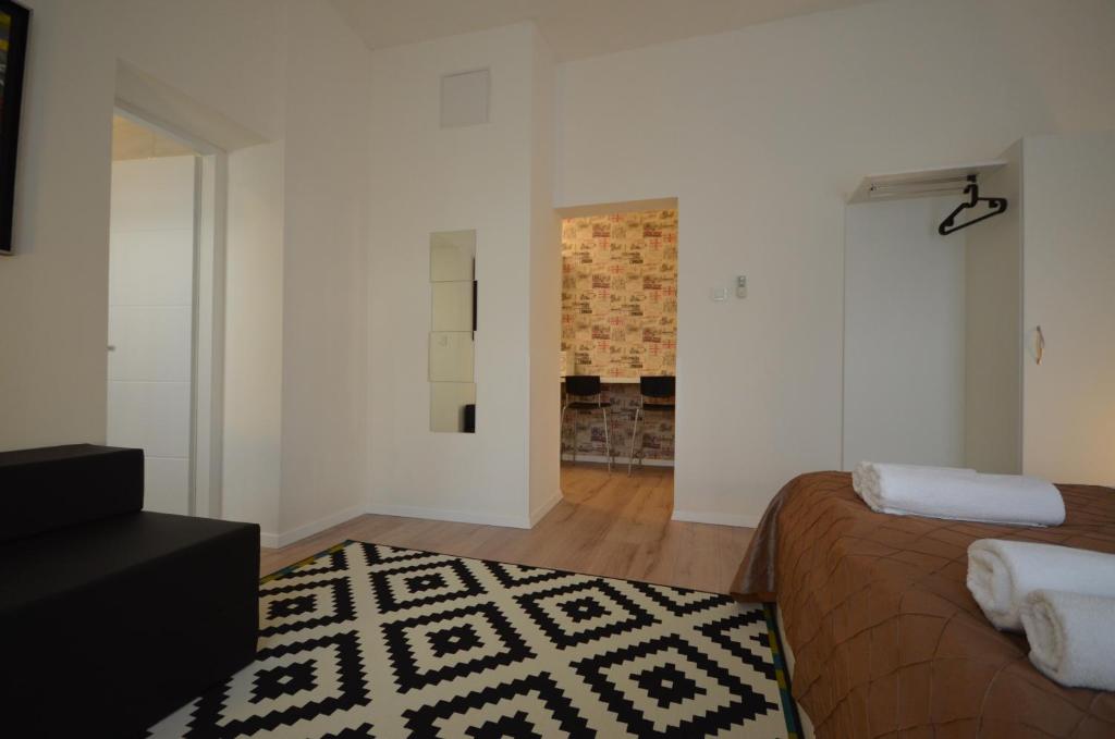 Posteľ alebo postele v izbe v ubytovaní Downtown Luxury Apartment