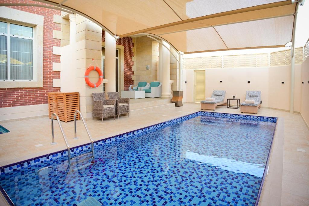 لابی و فضای عمومی Al Aziziyah Boutique Hotel By The Torch - تصویر ۵