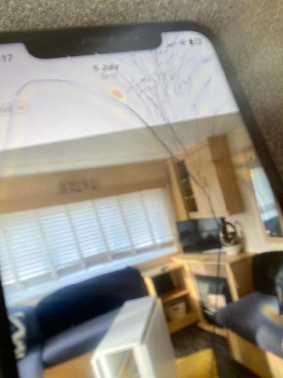 a view of a living room with a window at D andJ caravan in Winthorpe