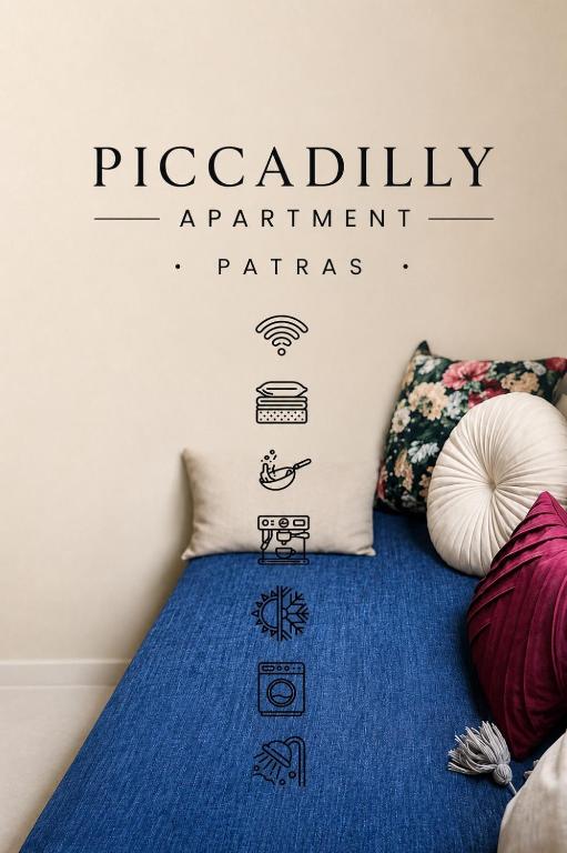 a bedroom with a bed with the words precision apartment apartment patras at Piccadilly Apartment Patras in Patra
