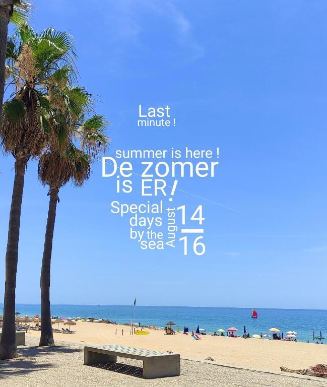 a picture of a beach with palm trees and a clock at Nautic in Quarteira
