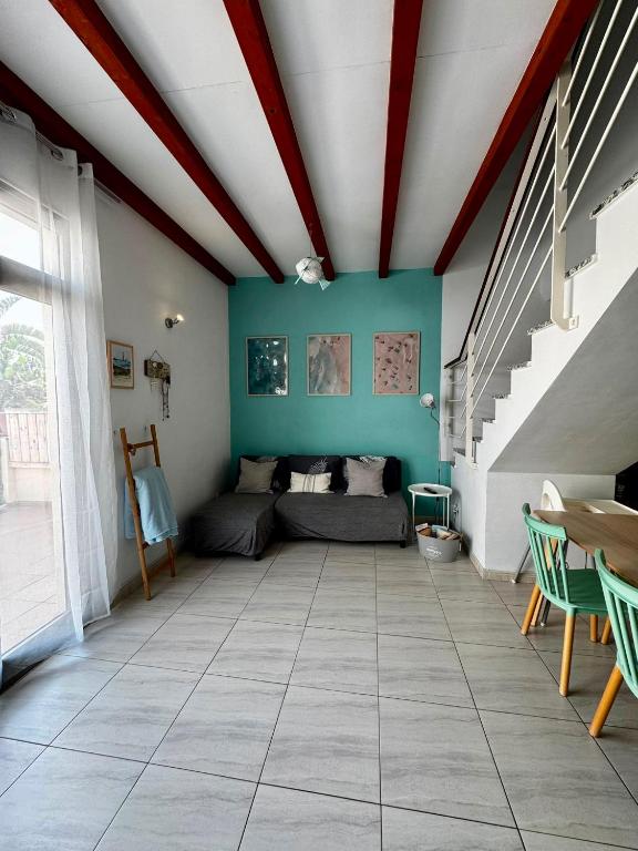a living room with a couch and a table at Casa Gino in El Cotillo