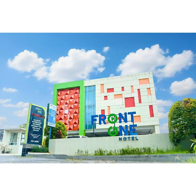 a front view of the front of a hotel at Front One Hotel Purwodadi in Purwodadi