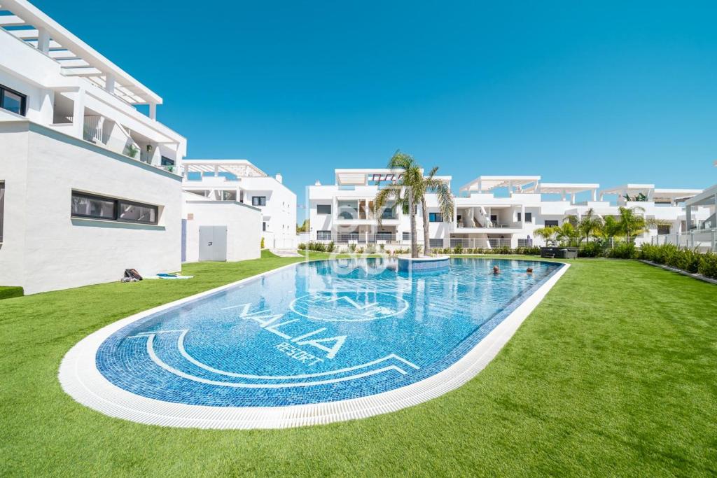 Casa de Adamant - Ground floor resort apartment with BBQ, shared jacuzzi and pool by OYOOSTAYS