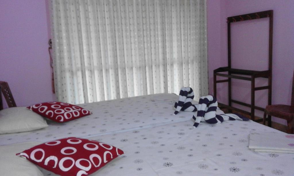 Postel nebo postele na pokoji v ubytování SA Village