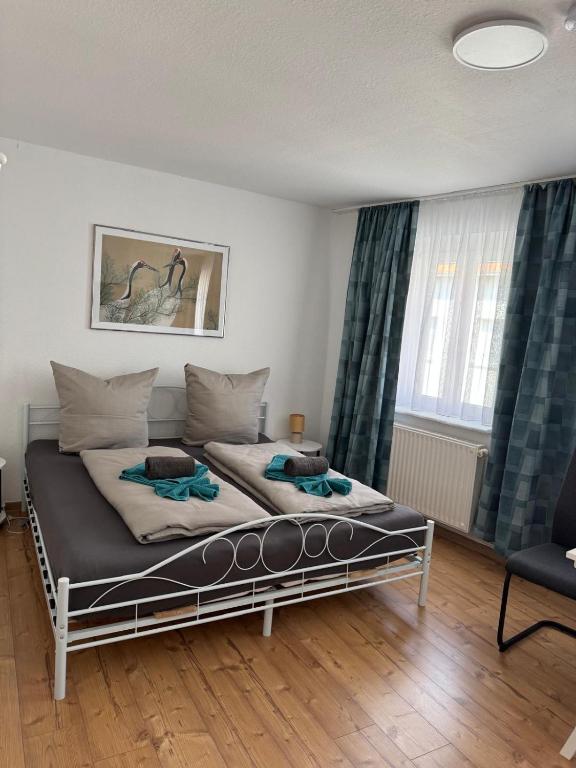a bedroom with a bed in a room at Elbstone 2 in Wittenberge