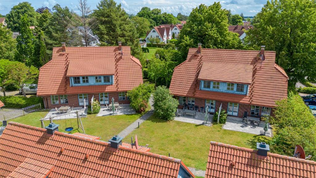 an aerial view of a house with red roofs at Heideröschen Park Heideröschen 7a in Zingst
