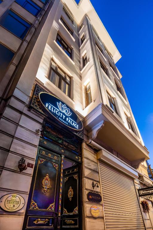 a building with a sign on the side of it at Felicity Palace Sirkeci in Istanbul