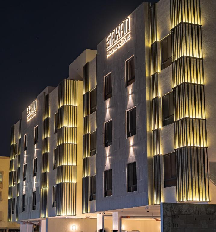 a building with lights on it at night at برايم سيغنتشر in Al Khobar