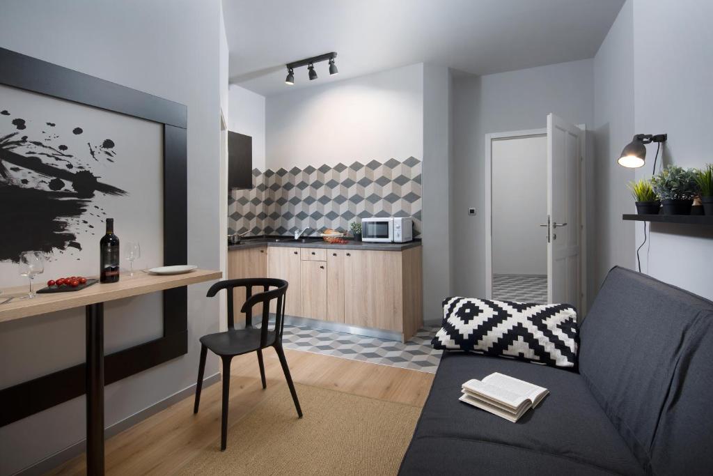 Kuchyň nebo kuchyňský kout v ubytování Studio Apartments River