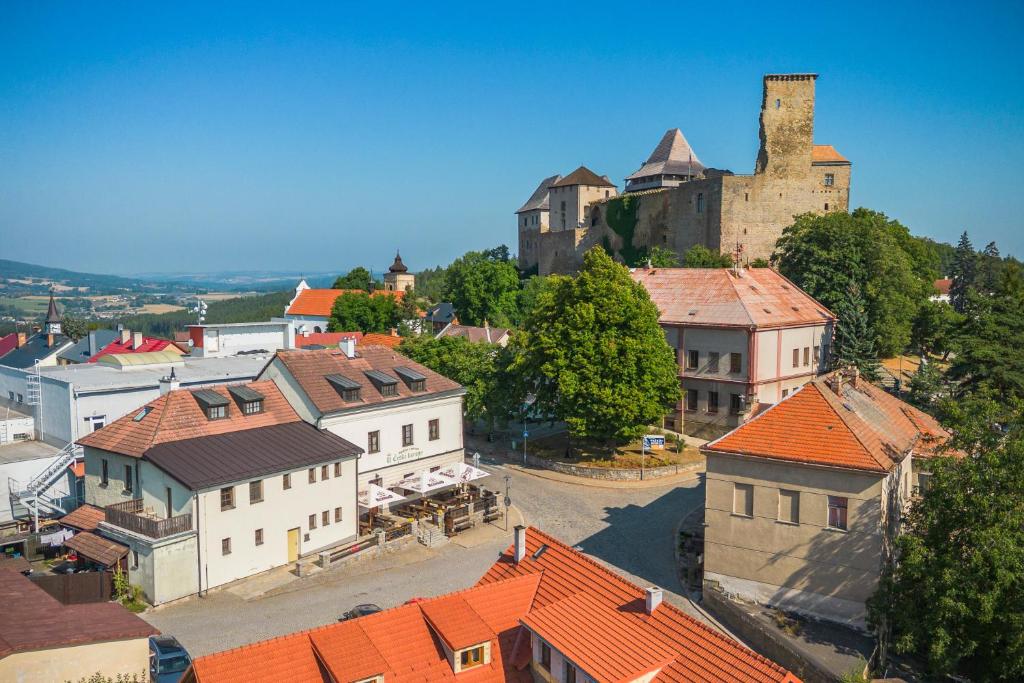an aerial view of a town with a castle at Penzion Brixen in Lipnice nad Sázavou