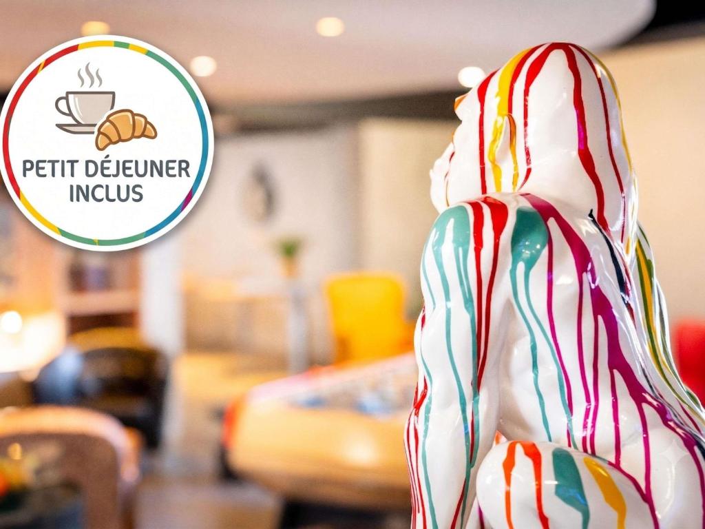 a close up of a display of candy canes at ibis Styles Brive Ouest in Brive-la-Gaillarde