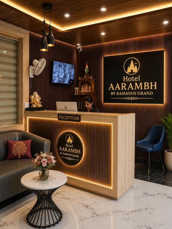 a lobby of a hotel with a reception desk at Hotel Aarambh By Ramayana Grand-Near Ram Mandir Ayodhya in Ayodhya