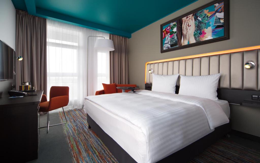 Postel nebo postele na pokoji v ubytování Park Inn by Radisson Riga Valdemara
