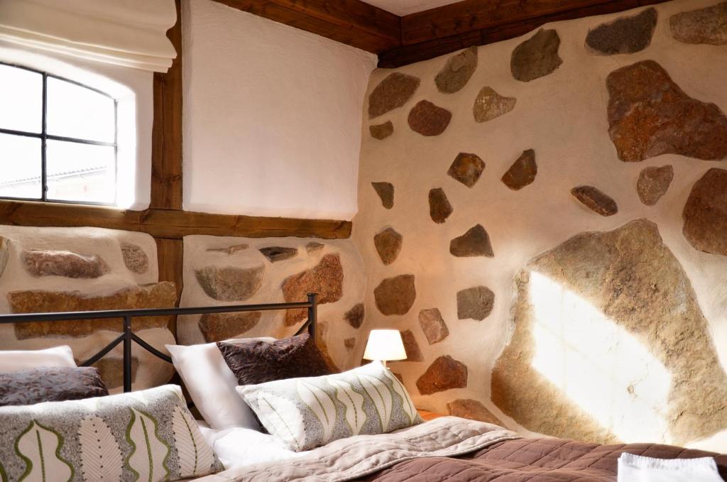 Postel nebo postele na pokoji v ubytování Torsborgs Gård